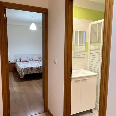 Quarto em Acomodações Particulares Habitación Con Baño Privado- En Casa Familiar Beatriz